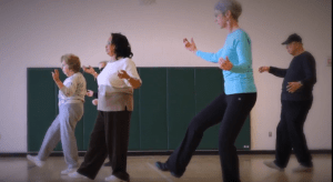 students practicing tai chi walking